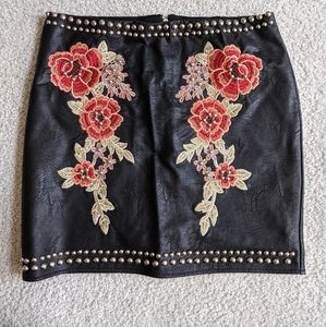 Black vegan leather mini skirt